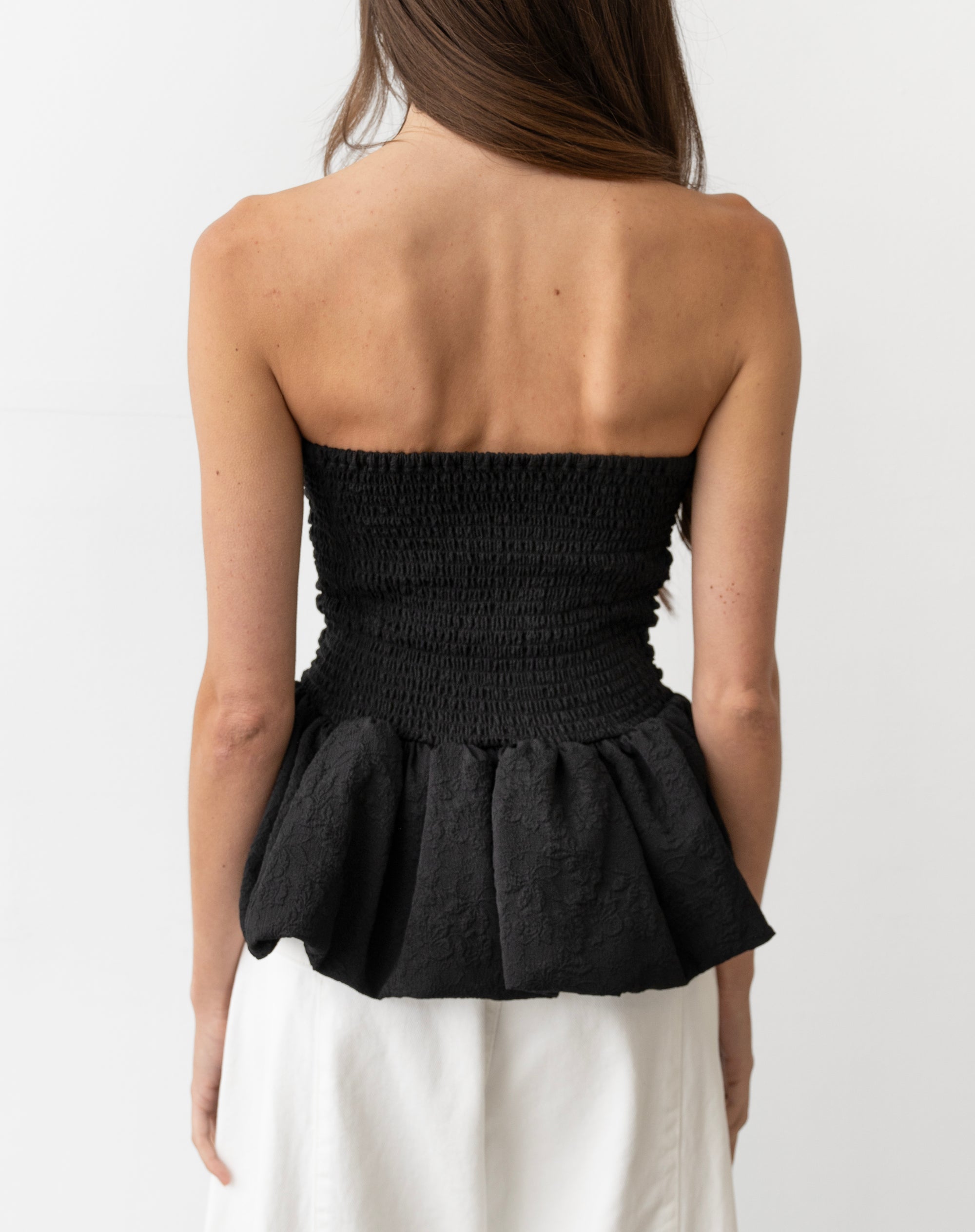 Top de tubo con peplum de jacquard de encaje rubí, negro